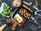 2-SECTION NON-STICK CAST ALUMINUM GRILL & GRIDDLE SKILLET with grilled sausages and egg omelet with vegetables
